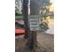 Sign indicating private launch ramp access, next to trees and a waterway at 2943 Annalee Rd, St Cloud, FL 34771