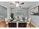Elegant dining room with a glass-top table and stylish chairs at 301 Lake Ned Rd, Winter Haven, FL 33884