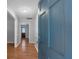 Inviting foyer with hardwood floors and a view into the home at 301 Lake Ned Rd, Winter Haven, FL 33884