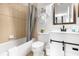 Cozy bathroom featuring tub and shower combo and stylish white vanity with mirror at 308 Yellow Snapdragon Dr, Davenport, FL 33837