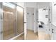 Bathroom featuring stand up shower and access to bedroom at 308 Yellow Snapdragon Dr, Davenport, FL 33837