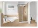 Lovely bathroom with tub and separate shower at 308 Yellow Snapdragon Dr, Davenport, FL 33837