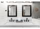 This bathroom features a double vanity with modern black fixtures and quartz countertops at 308 Yellow Snapdragon Dr, Davenport, FL 33837