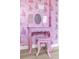 Pretty custom pink vanity and stool in a themed bedroom space at 308 Yellow Snapdragon Dr, Davenport, FL 33837