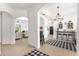 Open concept living spaces with tiled floors, neutral color palette, and ample natural light at 308 Yellow Snapdragon Dr, Davenport, FL 33837