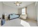 Bedroom featuring neutral carpet, and a window offering natural light at 3181 Bayview Ln, St Cloud, FL 34772