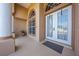 Inviting front entrance featuring double doors, elegant arches, and a tiled porch at 3181 Bayview Ln, St Cloud, FL 34772
