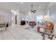Bright living area with tile flooring, leather seating, and modern decor at 3181 Bayview Ln, St Cloud, FL 34772