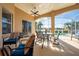 Relax on this covered patio, overlooking the pool and picturesque lake view, an ideal spot for entertaining at 3181 Bayview Ln, St Cloud, FL 34772