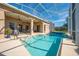 Inviting screened-in pool with ample patio space for outdoor entertaining at 3181 Bayview Ln, St Cloud, FL 34772