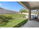 Spacious backyard with lush green lawn and a refreshing above ground pool, perfect for outdoor enjoyment at 341 Gardenia Ct, Kissimmee, FL 34759