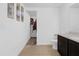 Bathroom with tiled floors, toilet and vanity sink with art hanging on the white walls at 341 Gardenia Ct, Kissimmee, FL 34759