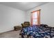 Bedroom with an armchair and daybed in a well lit room at 341 Gardenia Ct, Kissimmee, FL 34759