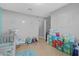 Cozy Bedroom with baby furniture, neutral walls, and ample natural light at 341 Gardenia Ct, Kissimmee, FL 34759