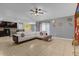 Open-concept living area that features tile floors and easy access to other rooms at 341 Gardenia Ct, Kissimmee, FL 34759