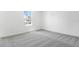 The bedroom has a single window with carpet at 3765 Deer Ridge Dr, Mount Dora, FL 32757