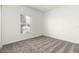 Neutral bedroom with carpet floors, window, and bright walls at 4928 Worchester Dr, Kissimmee, FL 34746