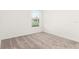 Neutral bedroom with carpet floors, window, and bright walls at 4928 Worchester Dr, Kissimmee, FL 34746