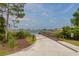 Community boat ramp leading to a lake with houses across the water at 6821 Cultivation Way, Winter Garden, FL 34787