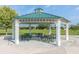 Beautiful community gazebo with many tables and a well maintained green roof at 6821 Cultivation Way, Winter Garden, FL 34787