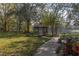 Scenic gazebo by the lake with a walking path and park bench at 6821 Cultivation Way, Winter Garden, FL 34787