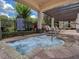 Inviting community hot tub with beautiful landscaping and comfortable seating at 6821 Cultivation Way, Winter Garden, FL 34787