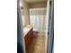 Well-lit bathroom with a vanity, toilet, and shower-tub combination at 7431 Cr 629, Bushnell, FL 33513