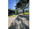 Inviting single-story home surrounded by mature trees and a well-maintained lawn at 7431 Cr 629, Bushnell, FL 33513