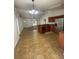Bright, open-concept kitchen with stainless appliances, and tile flooring at 7431 Cr 629, Bushnell, FL 33513