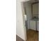 Convenient laundry room with washer, dryer, and ample storage space at 7431 Cr 629, Bushnell, FL 33513