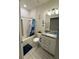 Standard bathroom including vanity, shower/tub, and toilet at 748 Citrus Isle Dr, Davenport, FL 33837