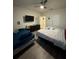 Well-lit bedroom featuring two beds, ceiling fan, and plenty of room at 748 Citrus Isle Dr, Davenport, FL 33837