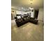 Open-concept living room and kitchen area, perfect for entertaining and Gathering gatherings at 748 Citrus Isle Dr, Davenport, FL 33837