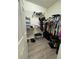 Organized walk-in closet with ample shelving and hanging space at 748 Citrus Isle Dr, Davenport, FL 33837