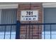 A sign on a brick pillar displays the address: 781 W. Lancaster Rd at 781 W Lancaster Rd # B38, Orlando, FL 32809