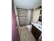 Modern bathroom with tiled shower, updated vanity, and contemporary lighting, providing a fresh and clean design at 781 W Lancaster Rd # B38, Orlando, FL 32809