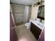 Updated bathroom with tiled shower, modern vanity, and contemporary fixtures, offering a spa-like experience at 781 W Lancaster Rd # B38, Orlando, FL 32809