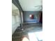 Bedroom featuring updated flooring, built-in shelving, and modern fixtures, perfect for a stylish and functional space at 781 W Lancaster Rd # B38, Orlando, FL 32809