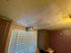 Ceiling with patched area and a smoke detector at 781 W Lancaster Rd # B38, Orlando, FL 32809