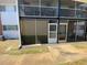 Exterior view of a screened patio in a multi-Gathering dwelling at 781 W Lancaster Rd # B38, Orlando, FL 32809