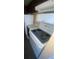 The kitchen features an electric stove top and white appliances at 781 W Lancaster Rd # B38, Orlando, FL 32809