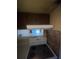 Kitchen with an electric stovetop and range hood at 781 W Lancaster Rd # B38, Orlando, FL 32809