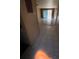 Open living area with tile flooring and glass sliding doors at 781 W Lancaster Rd # B38, Orlando, FL 32809