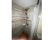 Shower stall featuring stone floors, unique shelving, and modern shower head at 781 W Lancaster Rd # B38, Orlando, FL 32809
