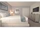 Well-decorated bedroom with a bed, closet, and bright natural light for a welcoming feel at 9042 Stinger Dr, Davenport, FL 33896