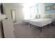 Fun bedroom featuring twin beds, colorful decorations, and a closet at 9042 Stinger Dr, Davenport, FL 33896