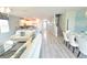 Open-concept layout showcases a seamless flow between the living, dining, and kitchen areas at 9042 Stinger Dr, Davenport, FL 33896