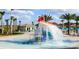 Community splash pad offers interactive water features and a fun, safe play area for  at 9042 Stinger Dr, Davenport, FL 33896