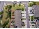 Aerial view of homes with modern amenities, well-kept lawns, and convenient parking for residents and guests at 9056 Wildflower Ln, Kissimmee, FL 34747