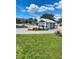 Community guard house with landscaped entry and well-maintained grounds at 914 Caribbean Dr, Davenport, FL 33897